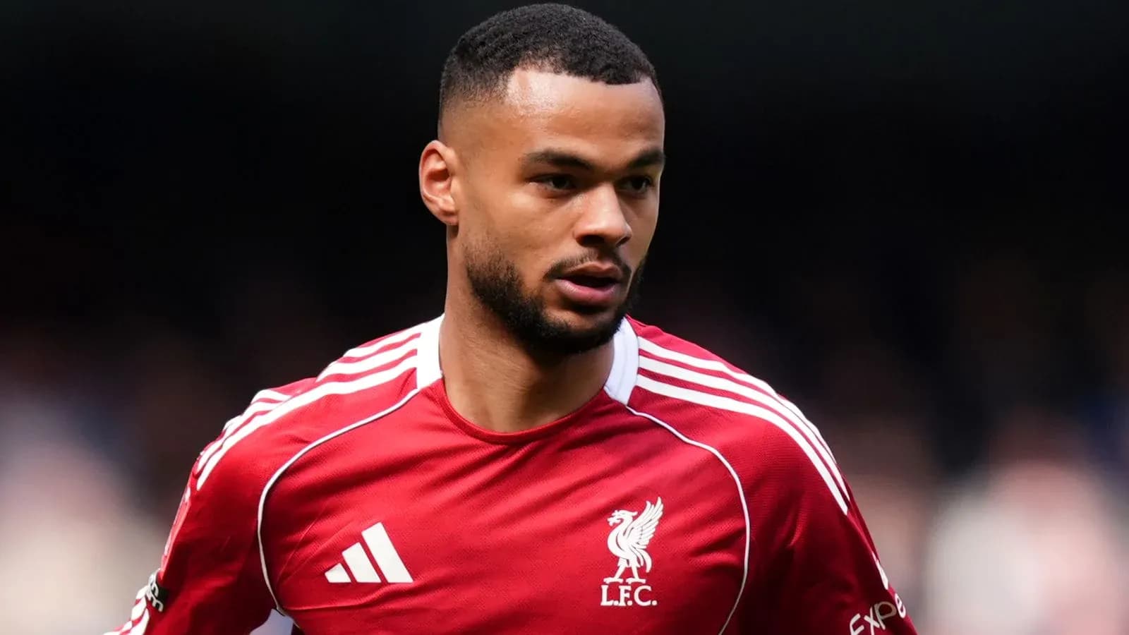 Player wearing Liverpool FC kit during match