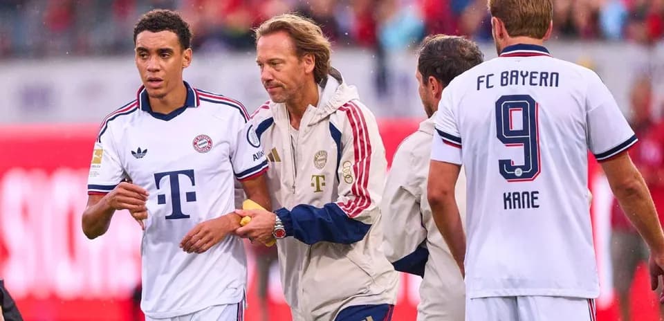 Bayern Munich players interacting on the pitch