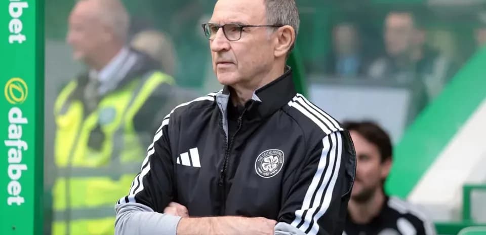 Manager observing match from sidelines during game