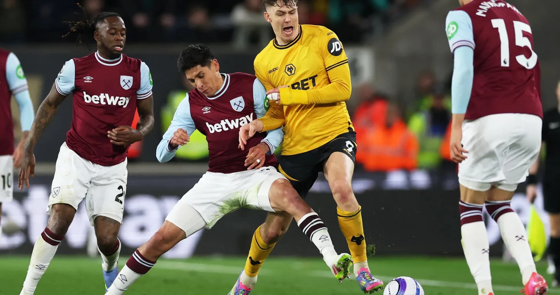 West Ham players challenging for the ball against Wolves