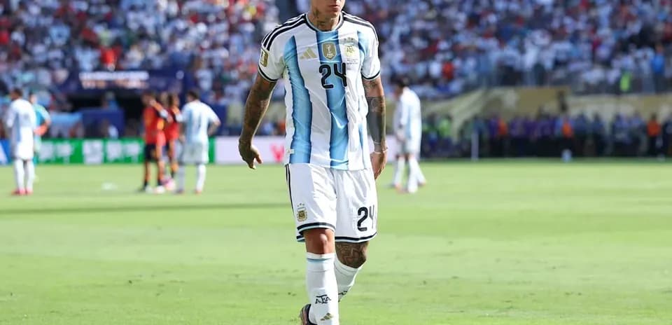 Argentinian player walking on field during match