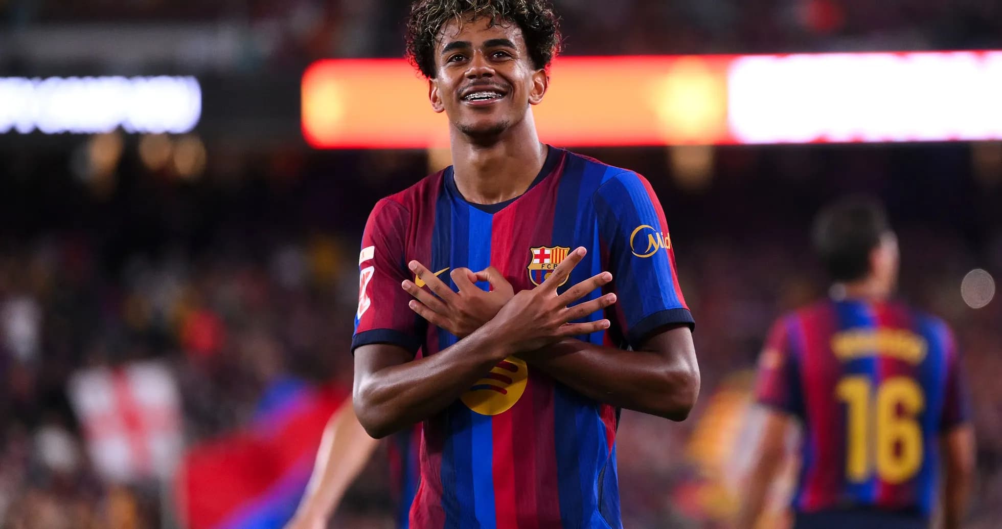 Barcelona player celebrating a goal at Camp Nou
