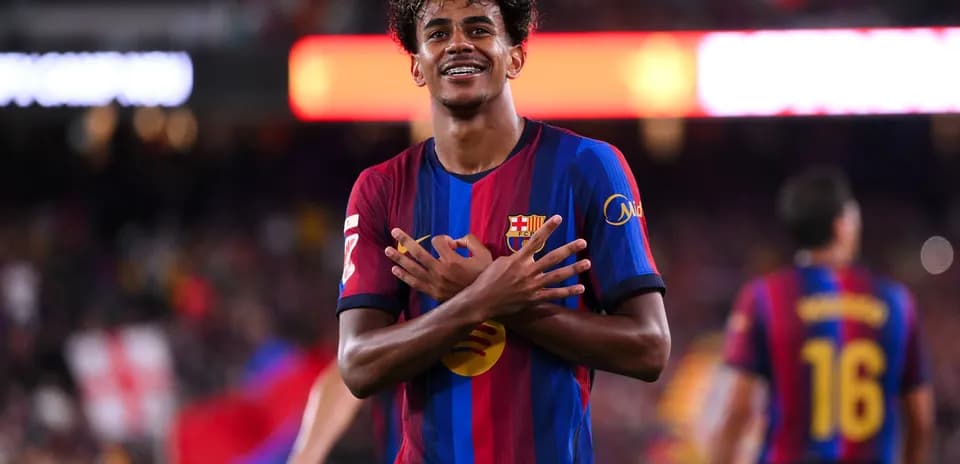 Barcelona player celebrating a goal at Camp Nou