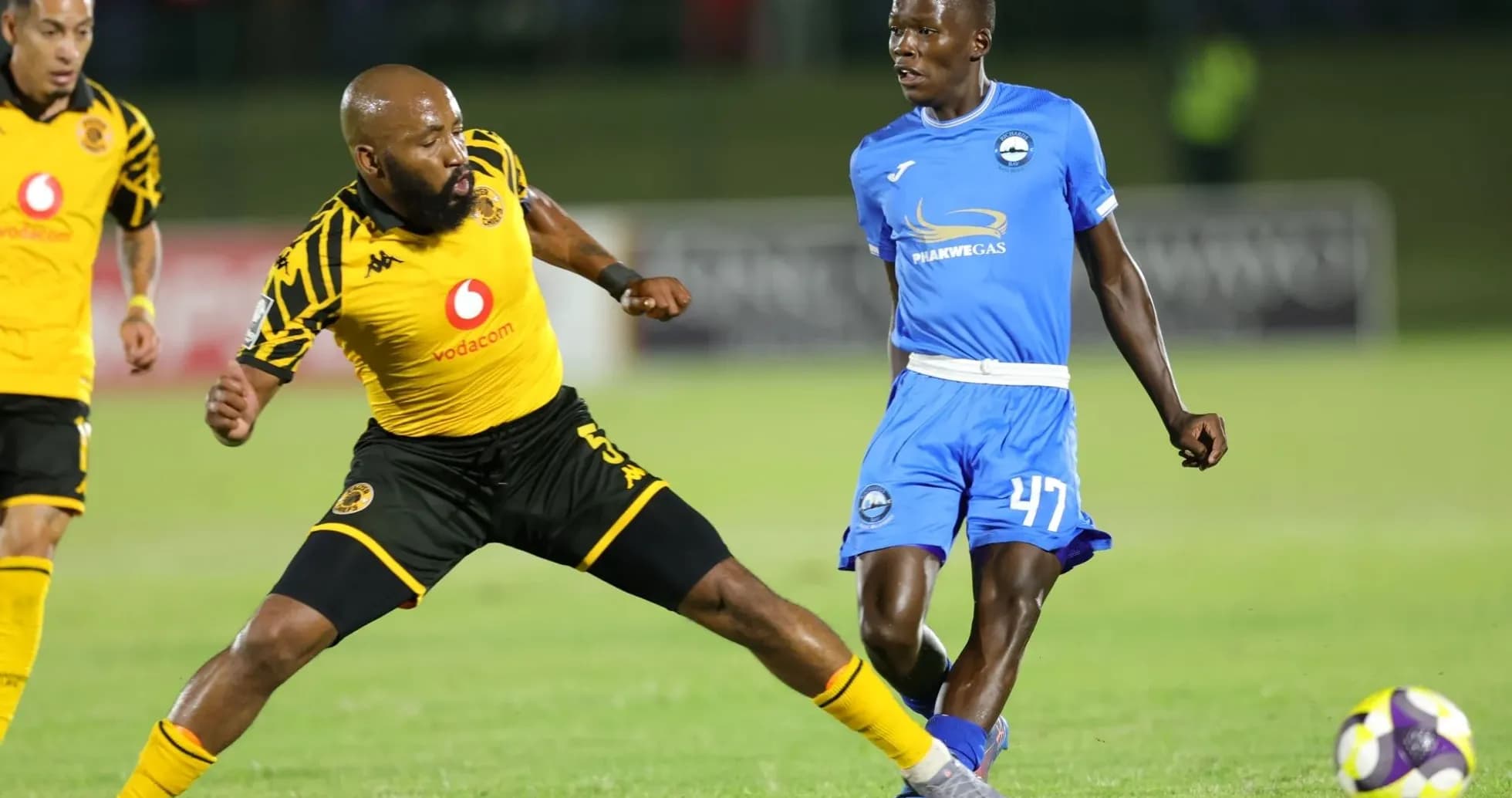 Player from Kaizer Chiefs evading an opponent