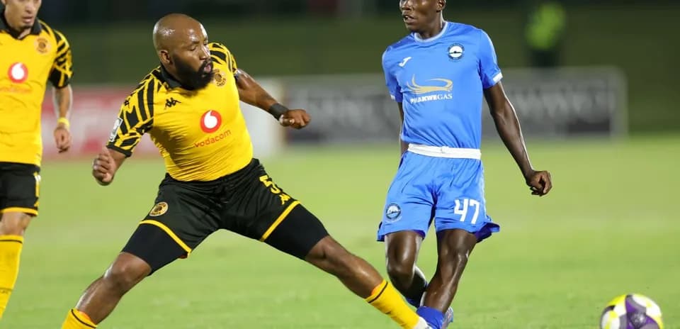 Player from Kaizer Chiefs evading an opponent