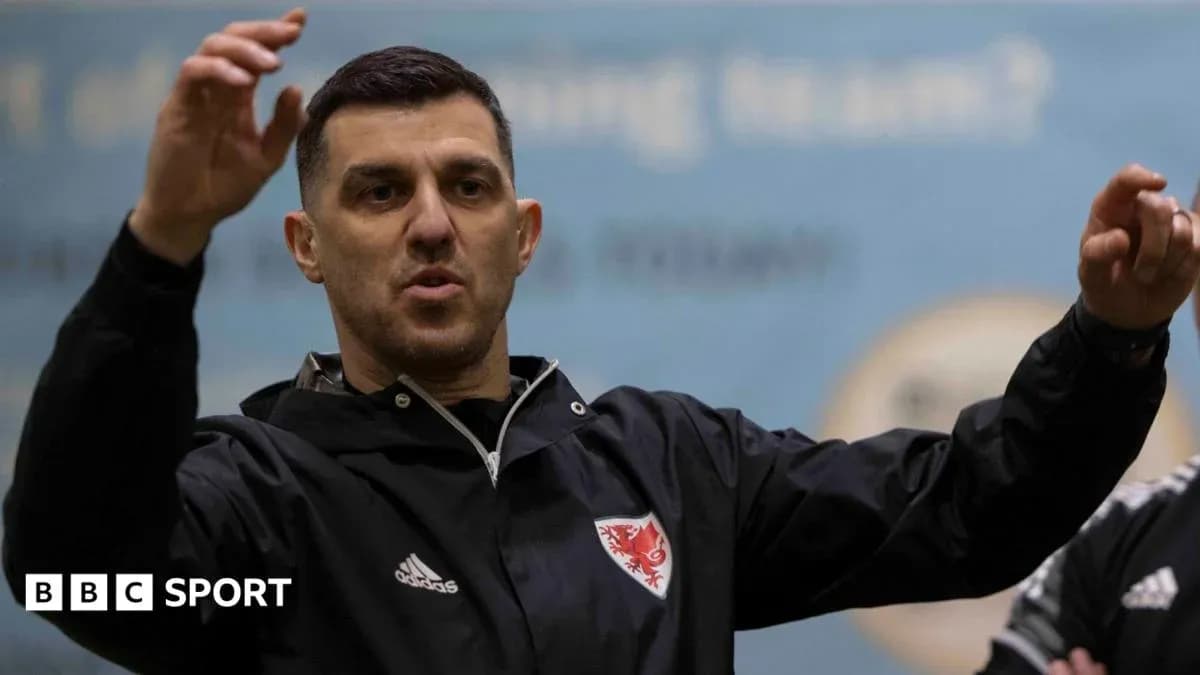 Coach gesturing during training session indoors