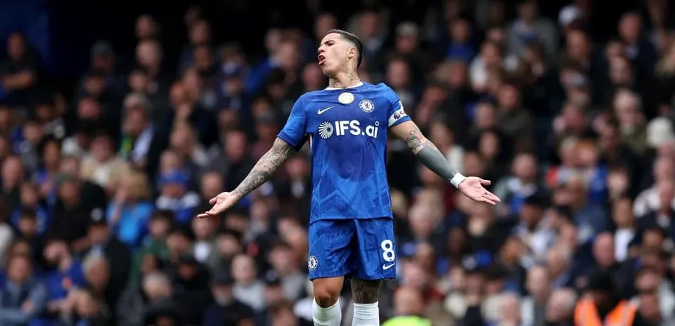 Chelsea player gesturing during match celebration
