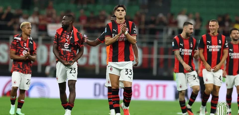 AC Milan players celebrating after a match