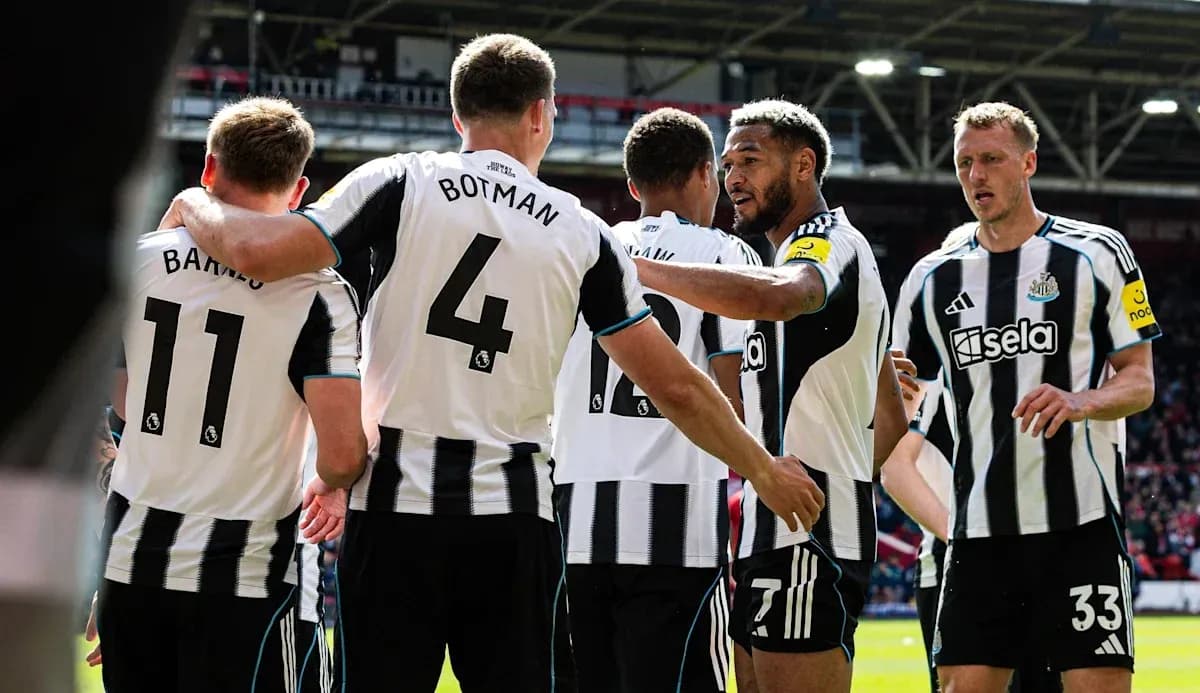 Newcastle United players celebrating a goal together