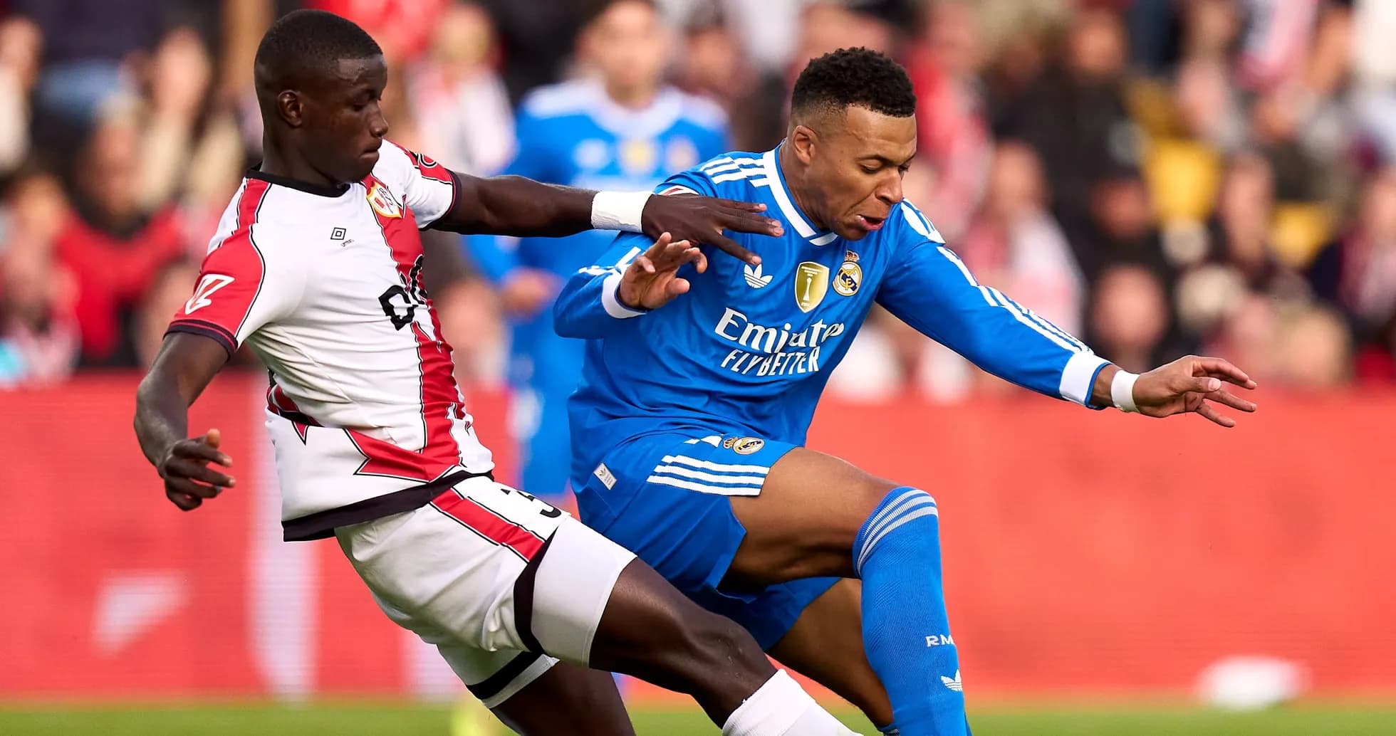 Player tackling opponent during a football match