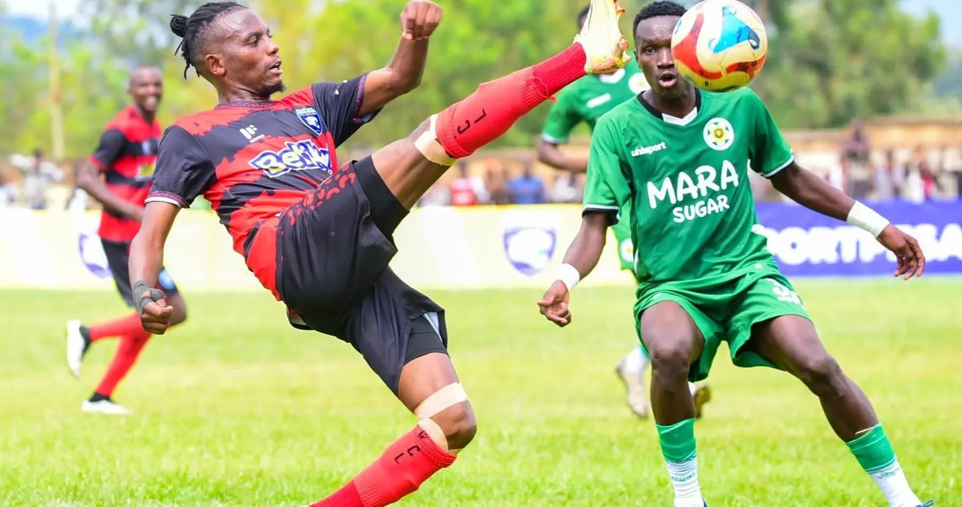 Player kicking ball during Murang'a SEAL match