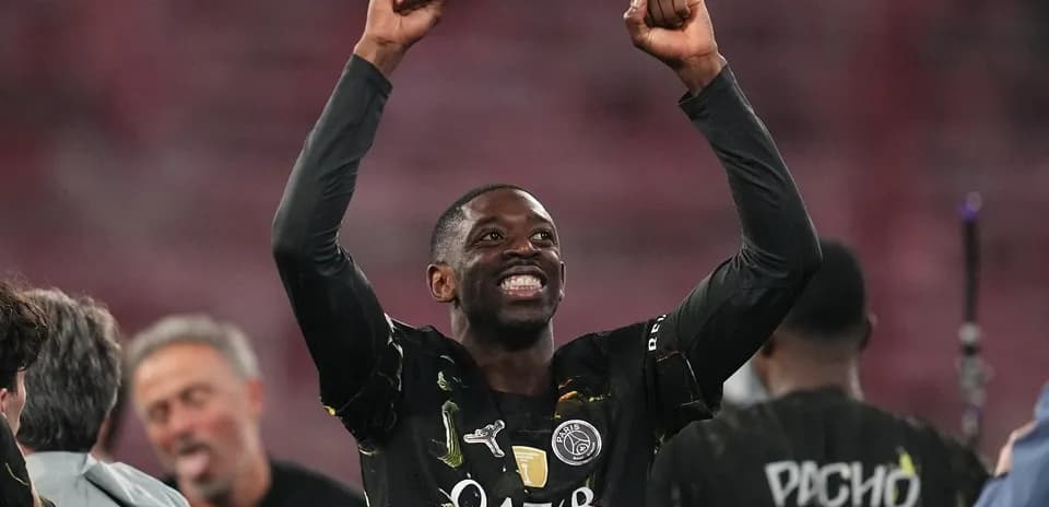 Player celebrating with raised fists after match