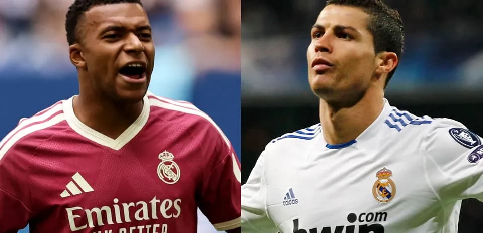 Two players in Real Madrid jerseys celebrating goals