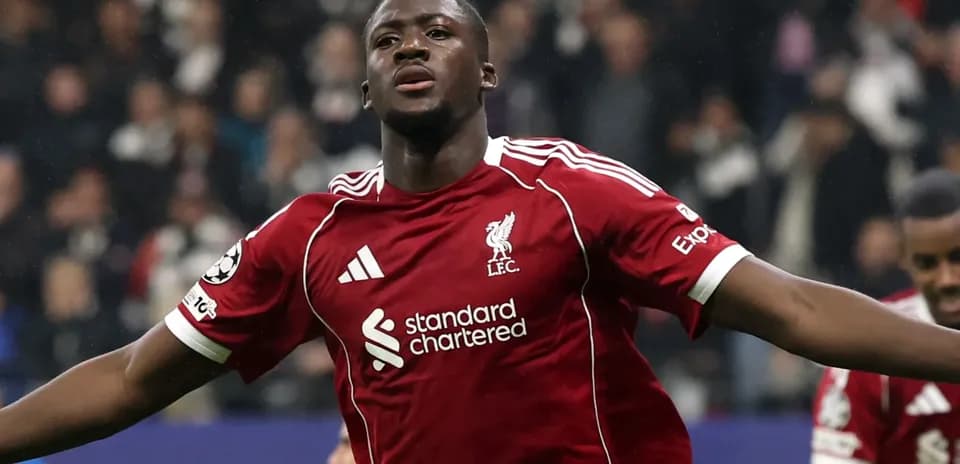 Player celebrating a goal in Liverpool kit