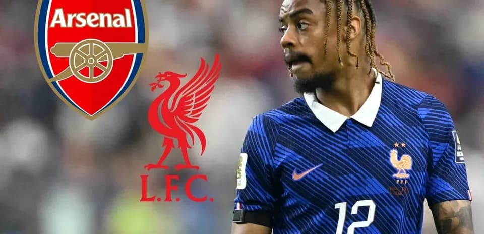 Player in France kit with Arsenal and Liverpool logos