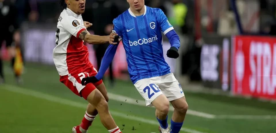 Two players contesting the ball during a match