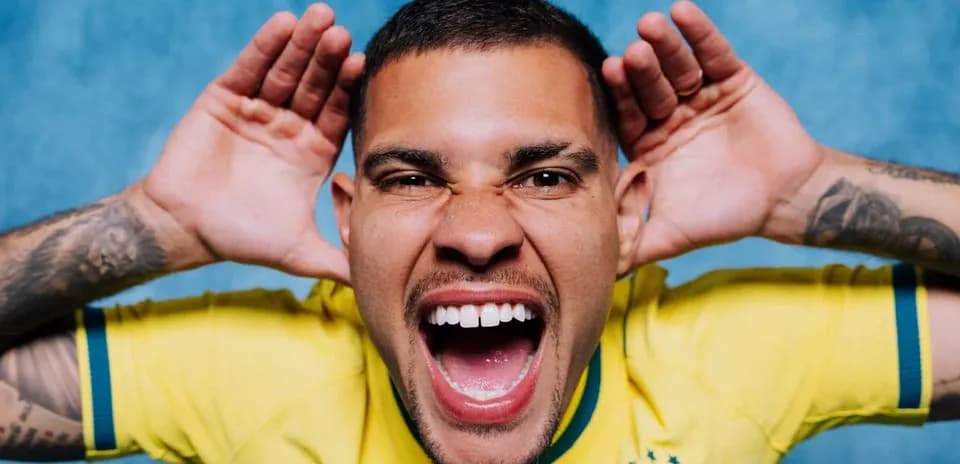 Player in yellow jersey making a loud expression