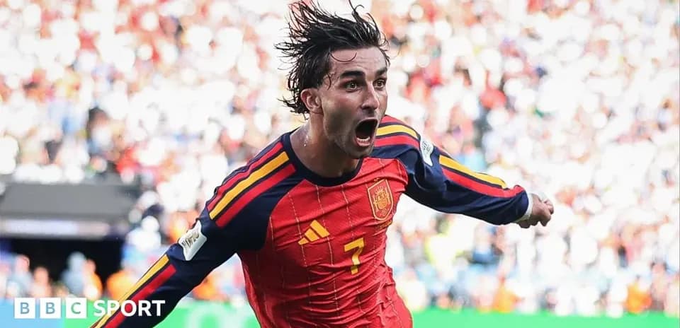 Player celebrating a goal in Spain jersey