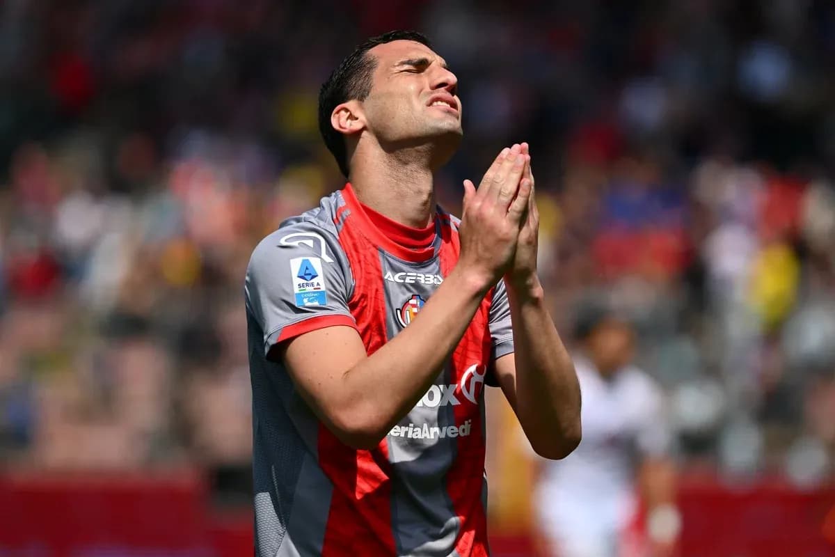 Player with hands clasped in prayer during match
