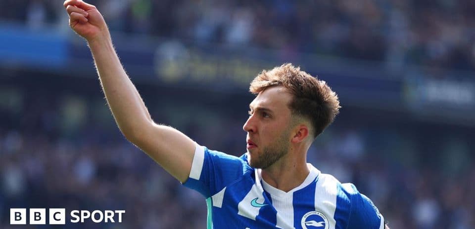 Player celebrating and pointing after scoring goal