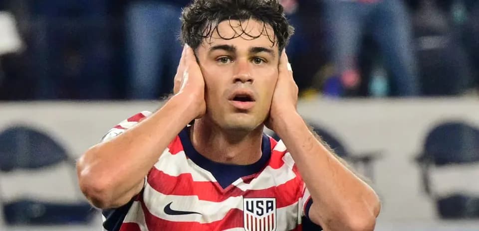 Player reacting during a match, hands on head