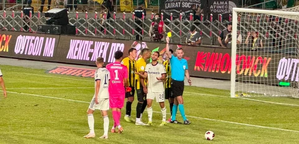 Players and referee during Anderlecht vs Kairat Almaty