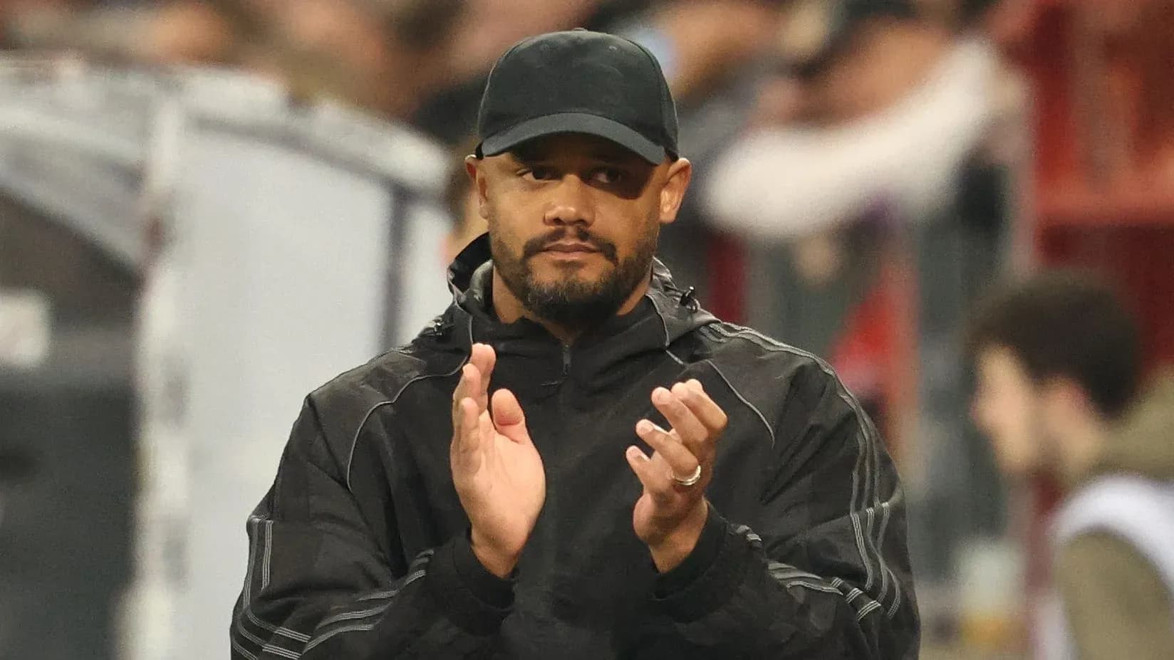 Coach applauding during a match or event