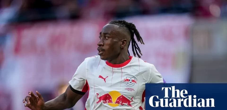 Player running on the field in RB Leipzig kit