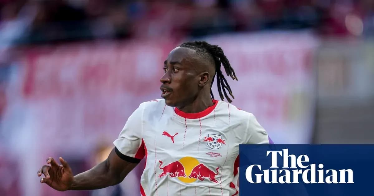 Player running on the field in RB Leipzig kit