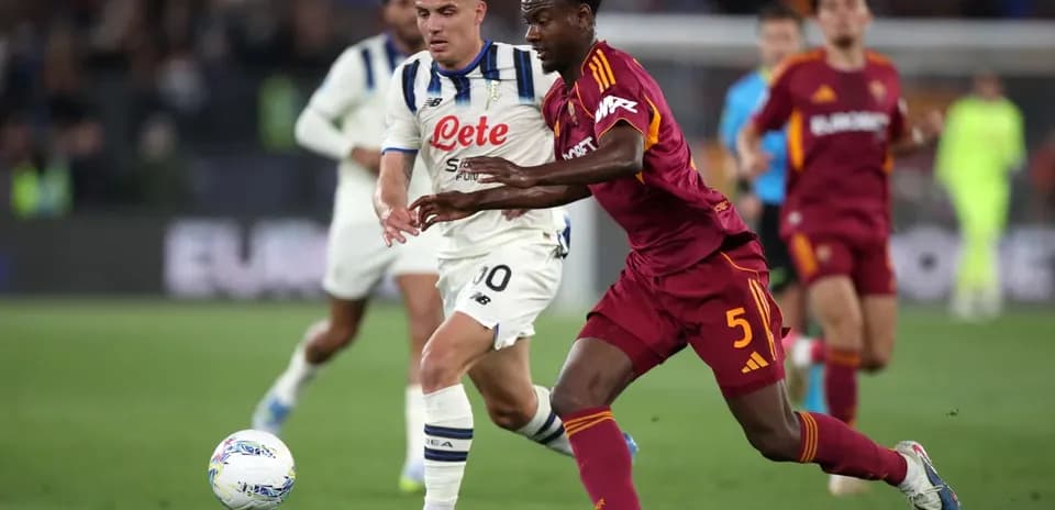 AS Roma player competing for the ball
