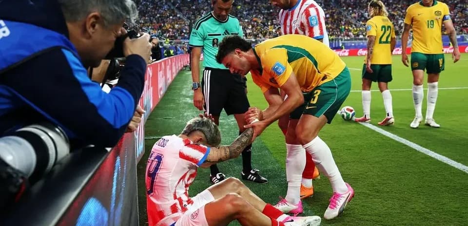Player receiving assistance on the sidelines during match