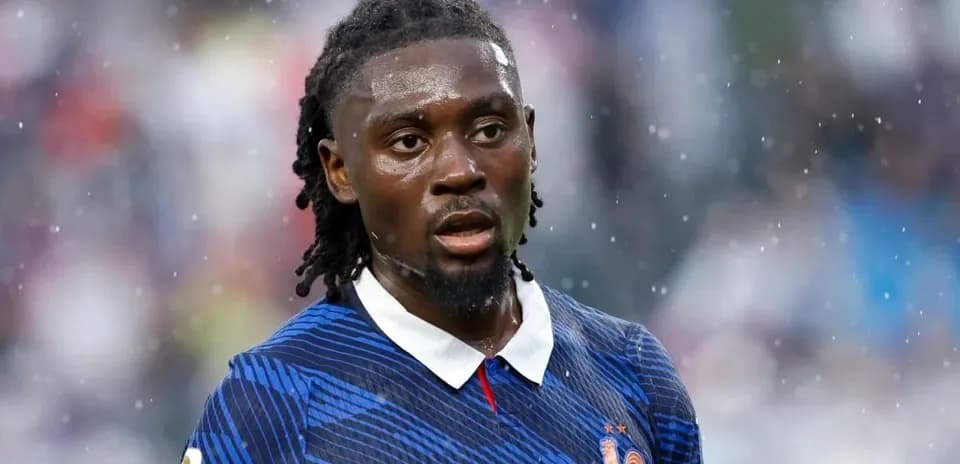 Football player wearing France kit during match
