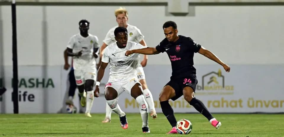 Players competing in KuPS vs Sabah FA match