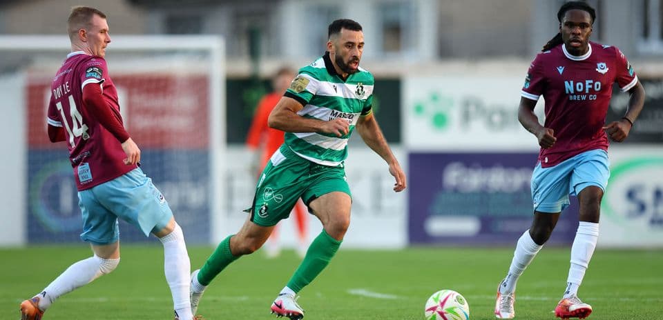 Shamrock Rovers player dribbling past opponent