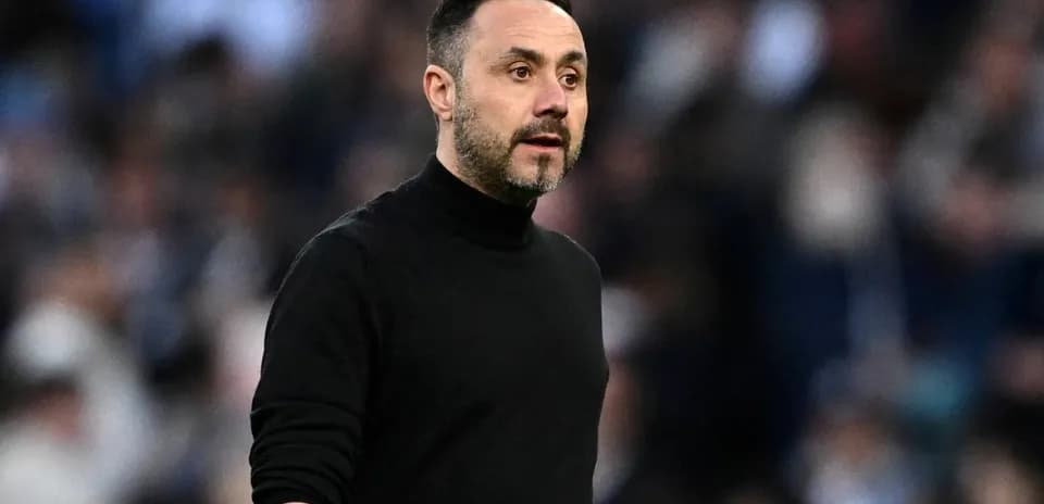 Manager observing the match from the sidelines