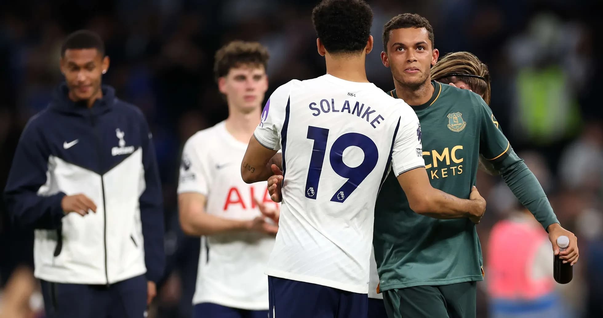 Players shaking hands after Tottenham vs Everton match