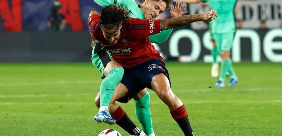 Player battling for the ball during La Liga match