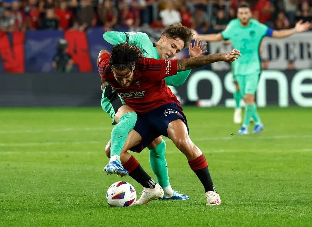 Player battling for the ball during La Liga match
