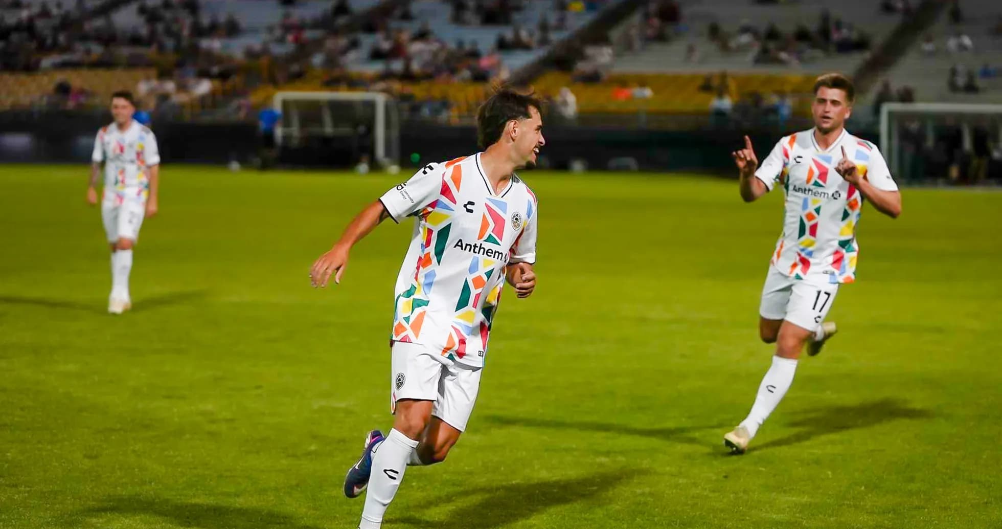 Players celebrating during Las Vegas Lights match