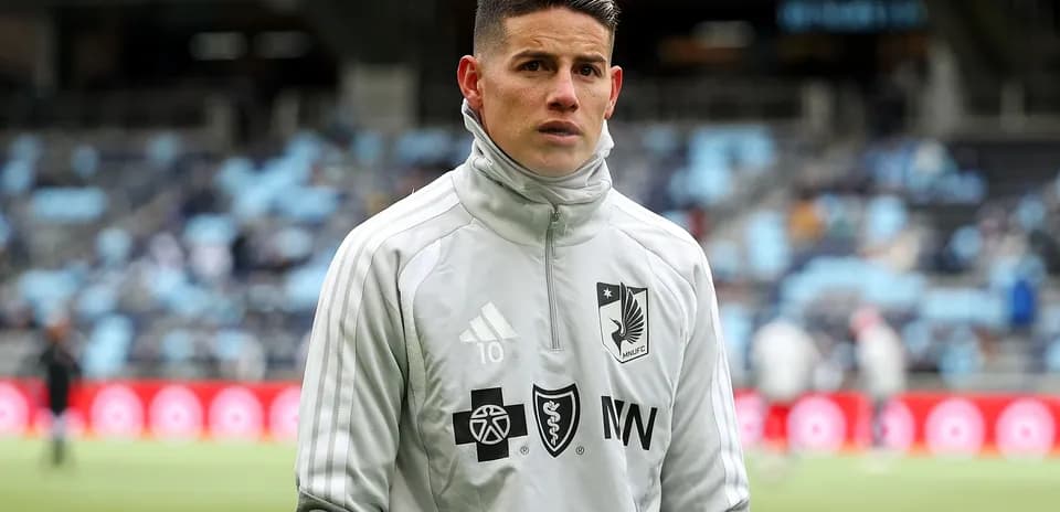 Player in warm-up gear at stadium before match