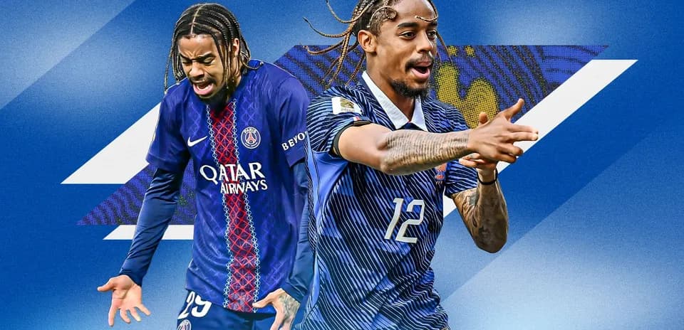 Two players in soccer kits posing against blue background