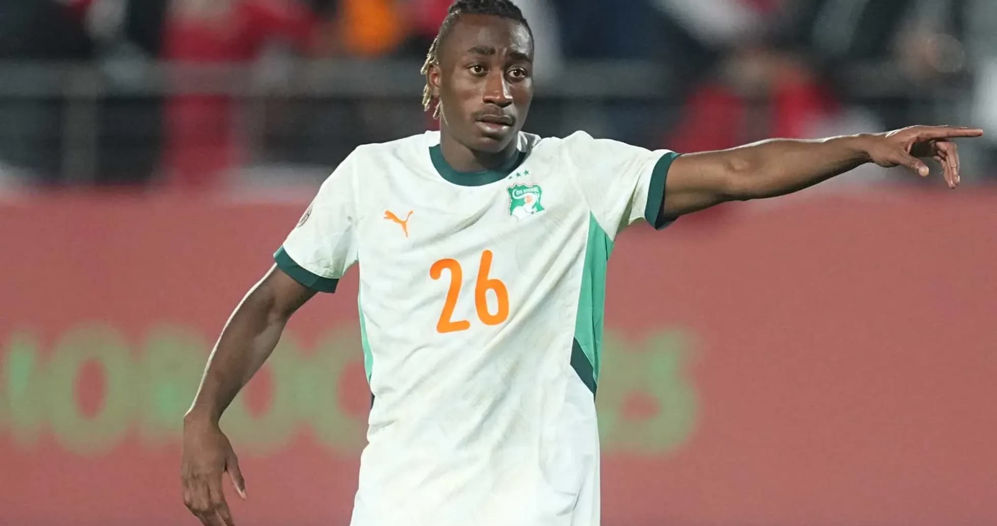 Player 26 from Ivory Coast directing play on field