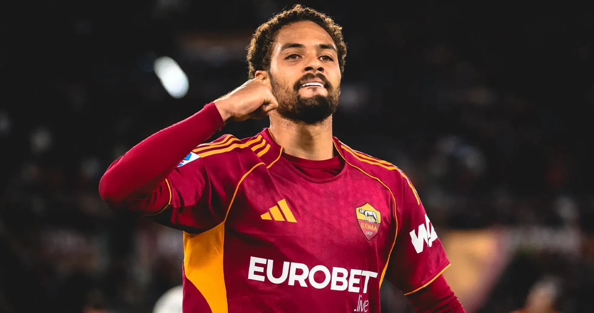 Player celebrating after scoring for AS Roma