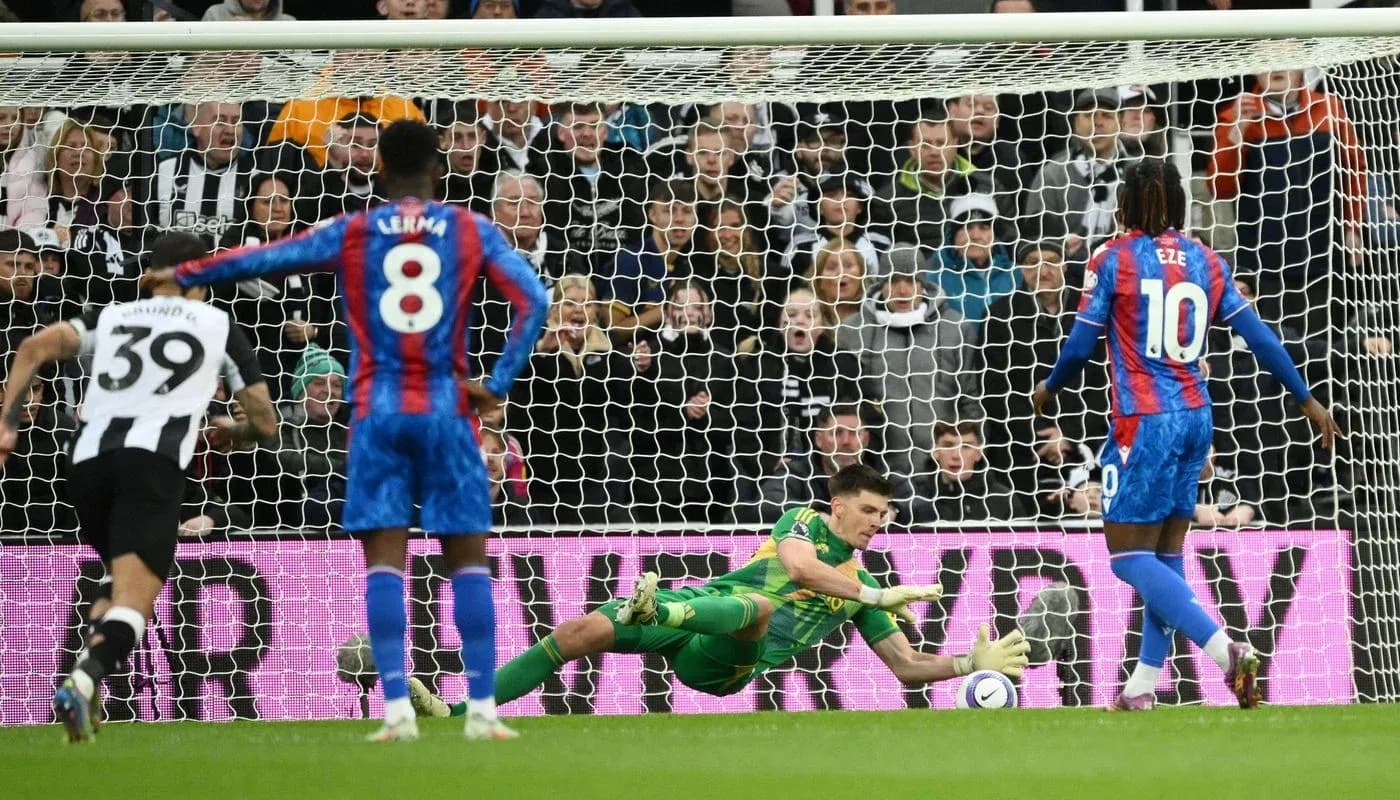 Goalkeeper saving a penalty during match