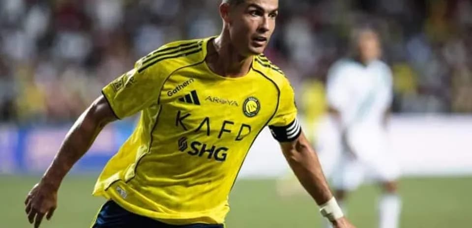 Player in yellow jersey running during match
