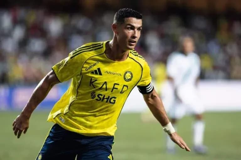 Player in yellow jersey running during match