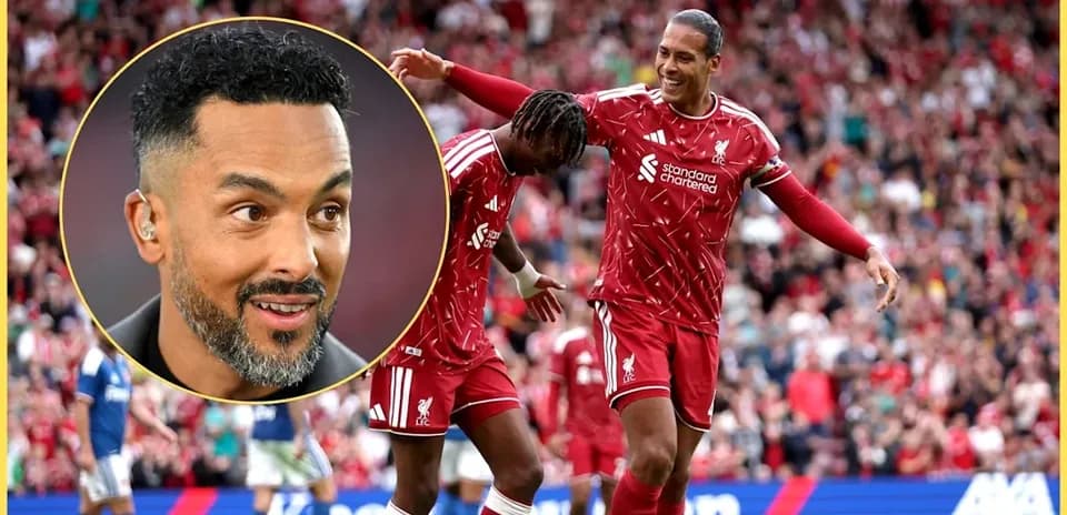 Liverpool players celebrating goal in stadium