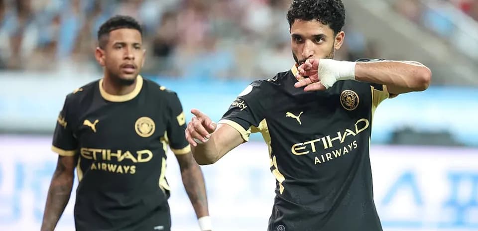 Player celebrating after scoring a goal during match