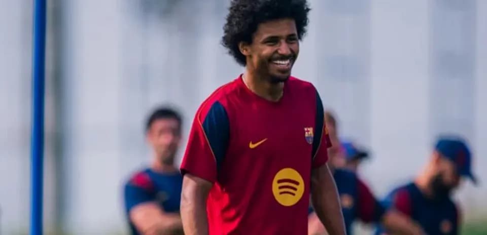 Player smiling during Barcelona training session