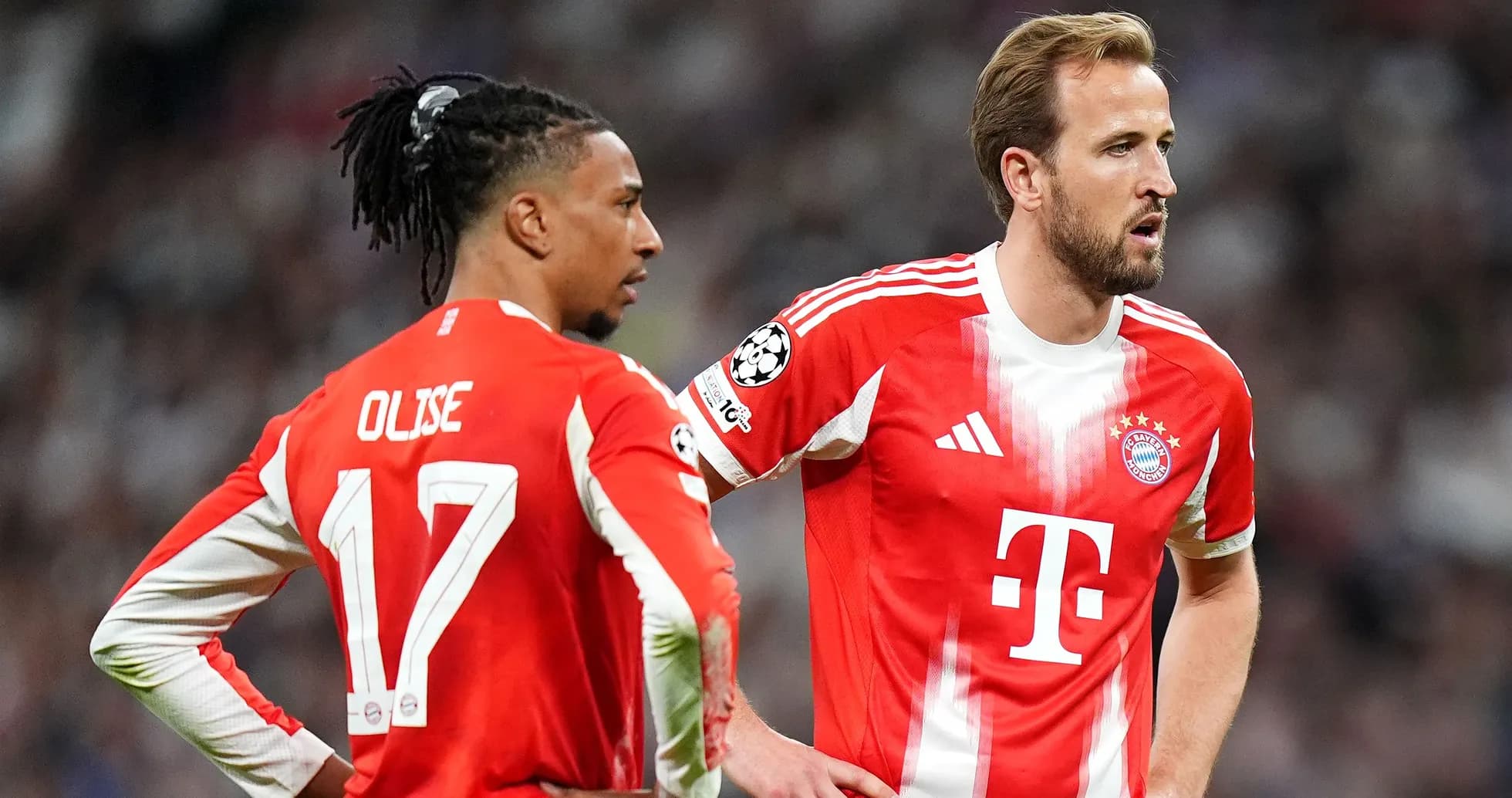 Two Bayern Munich players discussing during match